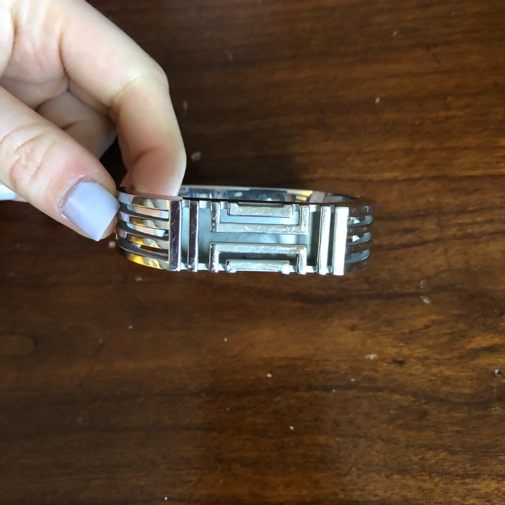 Silver Tory Burch Fitbit holder